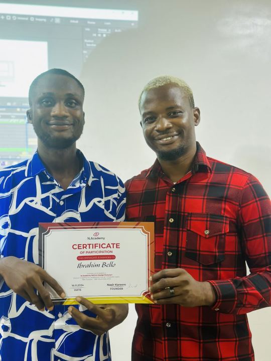 Nas with a graduate and their certificate