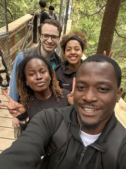 A selfie with friends on a forest trail