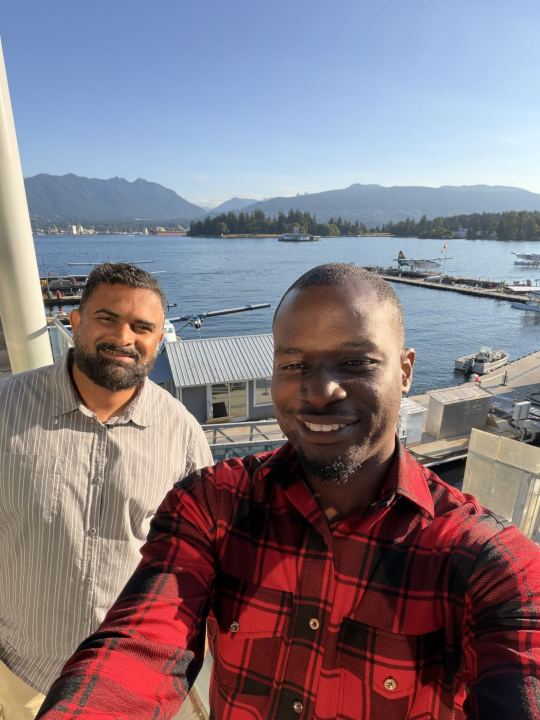 Nas and a friend by the harbour
