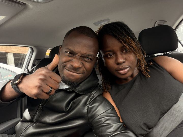 Nas and Praise taking a selfie in the car